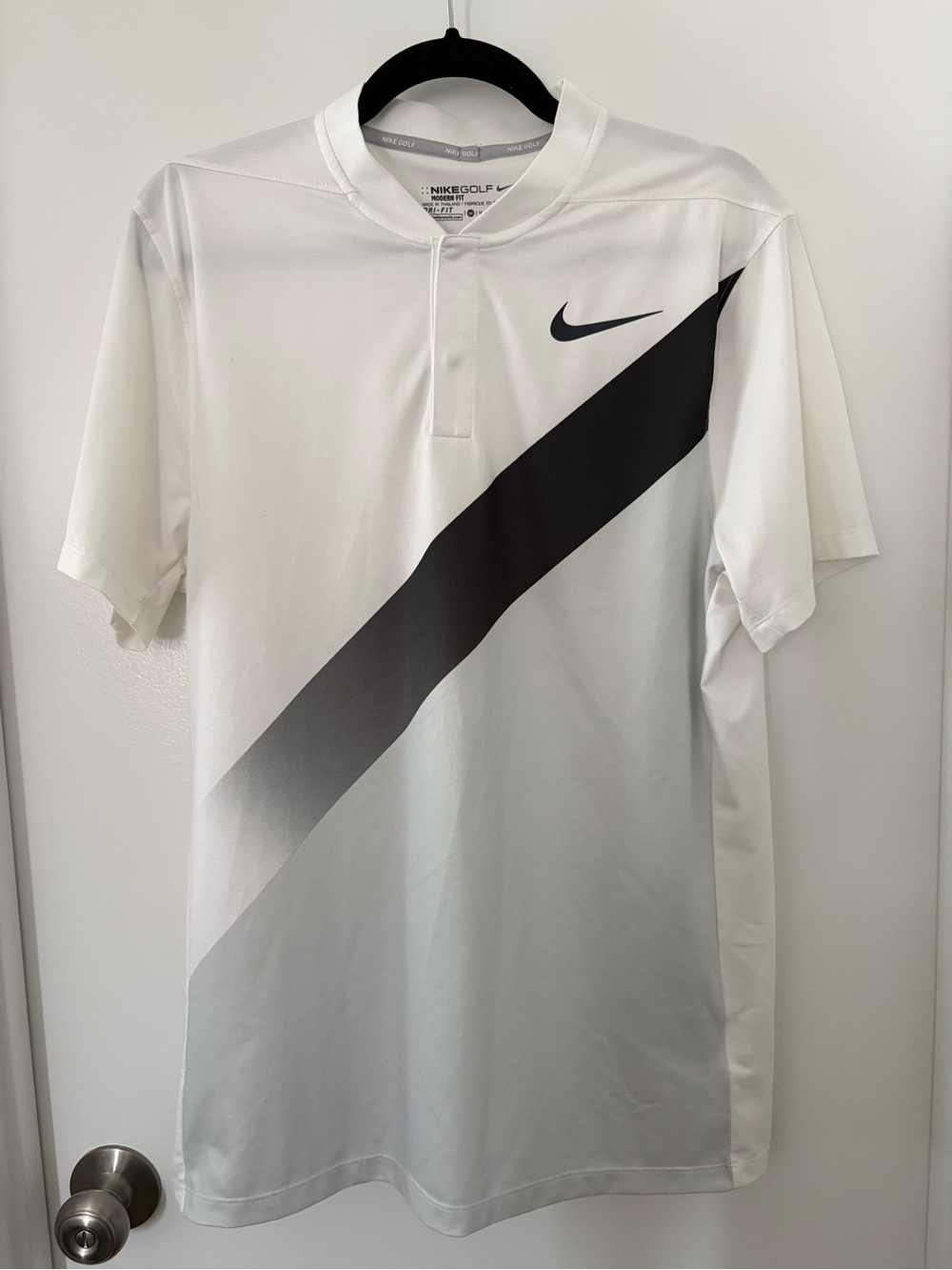 Nike Men's White Polo with Black Diagonal Swoosh